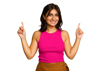 Young Indian woman isolated on green chroma background indicates with both fore fingers up showing a blank space.
