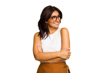 Young Indian woman isolated on green chroma background smiling confident with crossed arms.