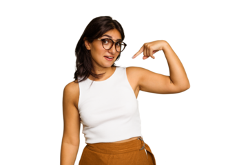 Young Indian woman isolated on green chroma background person pointing by hand to a shirt copy space, proud and confident