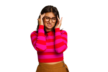 Young Indian woman isolated on green chroma background touching temples and having headache.