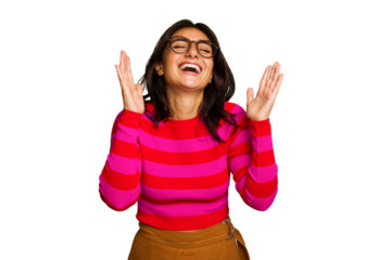 Young Indian woman isolated on green chroma background laughs out loudly keeping hand on chest.