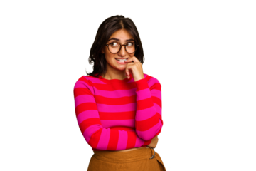 Young Indian woman isolated on green chroma background relaxed thinking about something looking at a copy space.