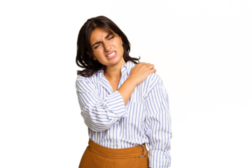 Young Indian woman isolated on green chroma background having a shoulder pain.