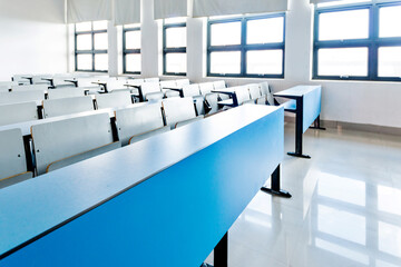 Fototapeta na wymiar Empty college lecture classroom in university