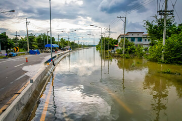 High-angle view of the Great Flood, Meng District, Thailand, on October 3, 2022, is a photograph from real flooding. With a slight color adjustment 