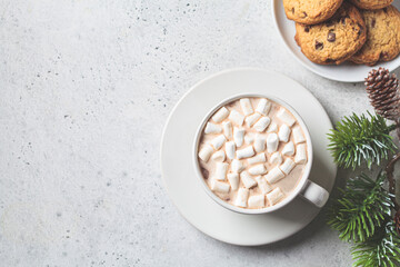 Cup of hot chocolate or cocoa with marshmallow. Festive Christmas background.