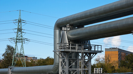 pipeline and power lines, in the photo pipelines and power line support on the background of the...