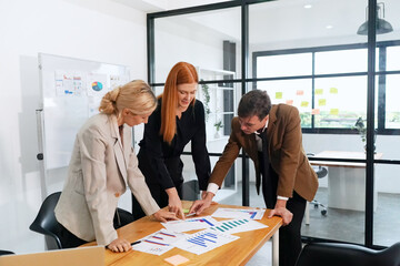 Diverse team of people meeting to discuss business growth