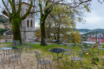 View of the stone village Ano Pedina during autumn with its architectural traditional old stone  buildings located on Tymfi mount, Zagori, Epirus, Greece,