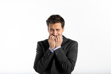 Depressed and frustrated businessman crying isolated on white background