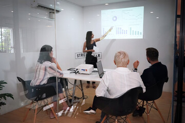 Diverse team of people meeting to discuss business growth