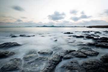 Sunset on the rocky shore.
