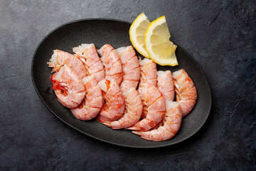 Shrimps on plate with lemon