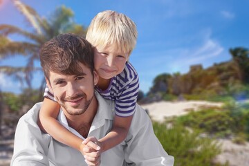 Shot of a man spending the day at the beach with his adorable child.