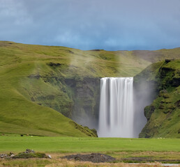 Skógafoss waterfall on the Skógá River in the south of Iceland at the cliff marking the former coastline.