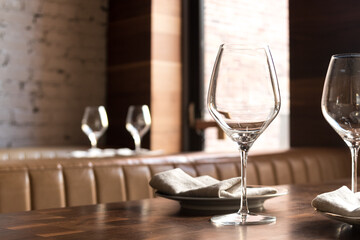 Wine glasses on table at restaurant