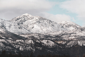Fototapeta na wymiar snow covered mountains in winter. background