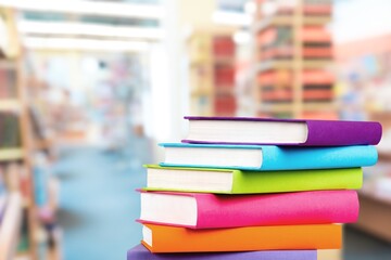 Big pile of books over light background. Education, self-learning, book swap, hobby, relax time