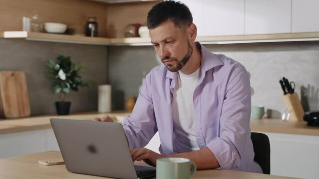 Footage of desperate young Caucasian man feeling worried about financial problem. Tired stressed businessman in casual outfit looking frustrated at camera thinking of money debt, budget loss