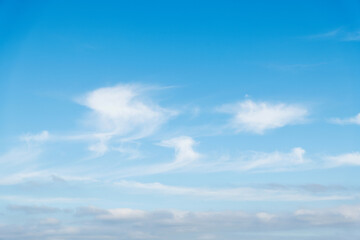 Blue sky with white clouds background