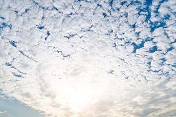 The blue sky covered with white clouds