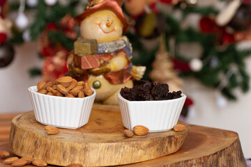 bowl full of raisins and  almonds- Christmas time