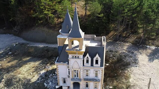 One of identical houses all in style of mini French chateaux. Before it filled for bankruptcy, developer had completed 587 houses in the development