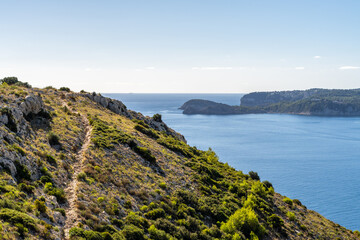 Fototapeta na wymiar Landscape with mountains and sea, on a sunny day