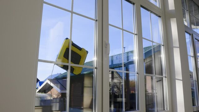Modern window cleaning appliances work independently from the outside of the house. Automatic window washer moves along a given trajectory while working on the window