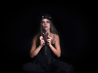 Obraz premium Woman with voodoo doll