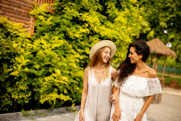 Pretty young women walking in the park