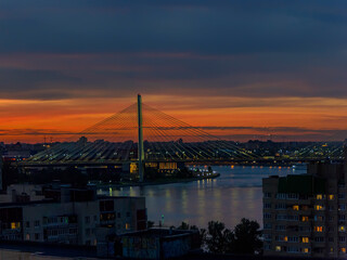 Fototapeta premium Bright summer sunset in the city taken from a tall building.