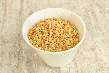 Crunched roasted peanut in the bowl