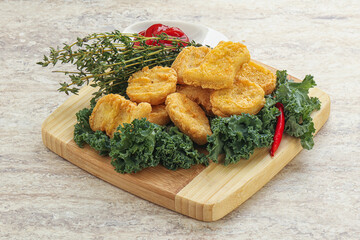 Crispy chicken nuggets with tomato ketchup