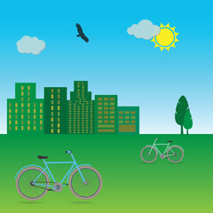 Meadow landscape with bicycles, trees and blocks, world car free day