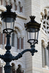 Monaco, Monaco - 02.10.2022: A streetlight in front of the Saint-Nicolas Cathedral in Monaco