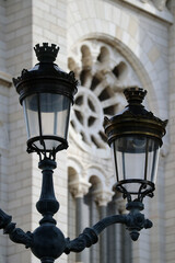 Fototapeta na wymiar Monaco, Monaco - 02.10.2022: A streetlight in front of the Saint-Nicolas Cathedral in Monaco