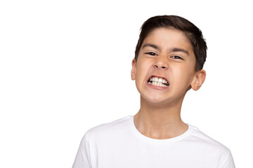 Boy clenching his teeth on white background