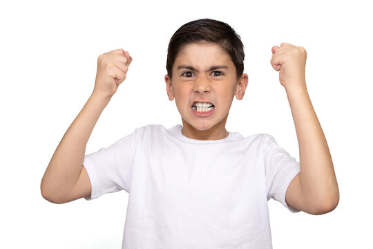 Loads of aggression in a little boy - education concept hinting behavioral problems in young children (shallow DOF) - little boy with hands clenched into fists about to punch someone