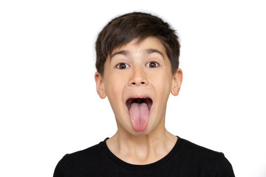 Photo of adorable young happy boy looking at camera. Isolated on the white background
