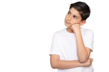 Fototapeta premium Thoughtful boy on white background