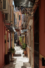 Fototapeta na wymiar A very narrow street in Corfu town, a phenomenal view.
