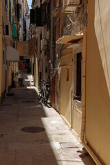 Obraz na płótnie Canvas A beautiful narrow street in the old part of Corfu town.
