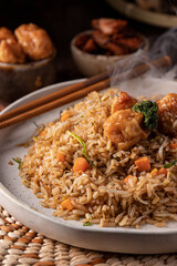 Hot asian rice with chopsticks