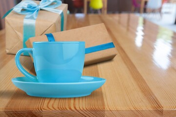 Happy Father's Day inscription with a cup of coffee on the desk