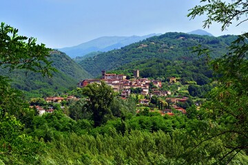 distant landscape of the medieval village of Ghivizzano in the province of Lucca, Tuscany, Italy