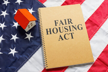 Fair housing act near tiny house on a flag. - obrazy, fototapety, plakaty