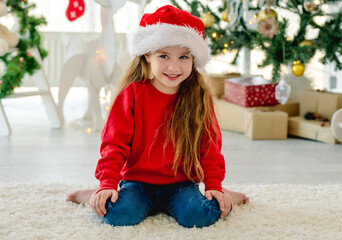 Child girl in Christmas time