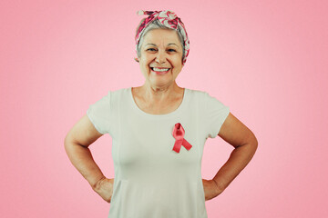 Mature Woman With Pink Ribbon isolated, for breast cancer campaign.