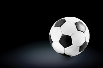 Fototapeta na wymiar A ball Football compact size and foam core on the background